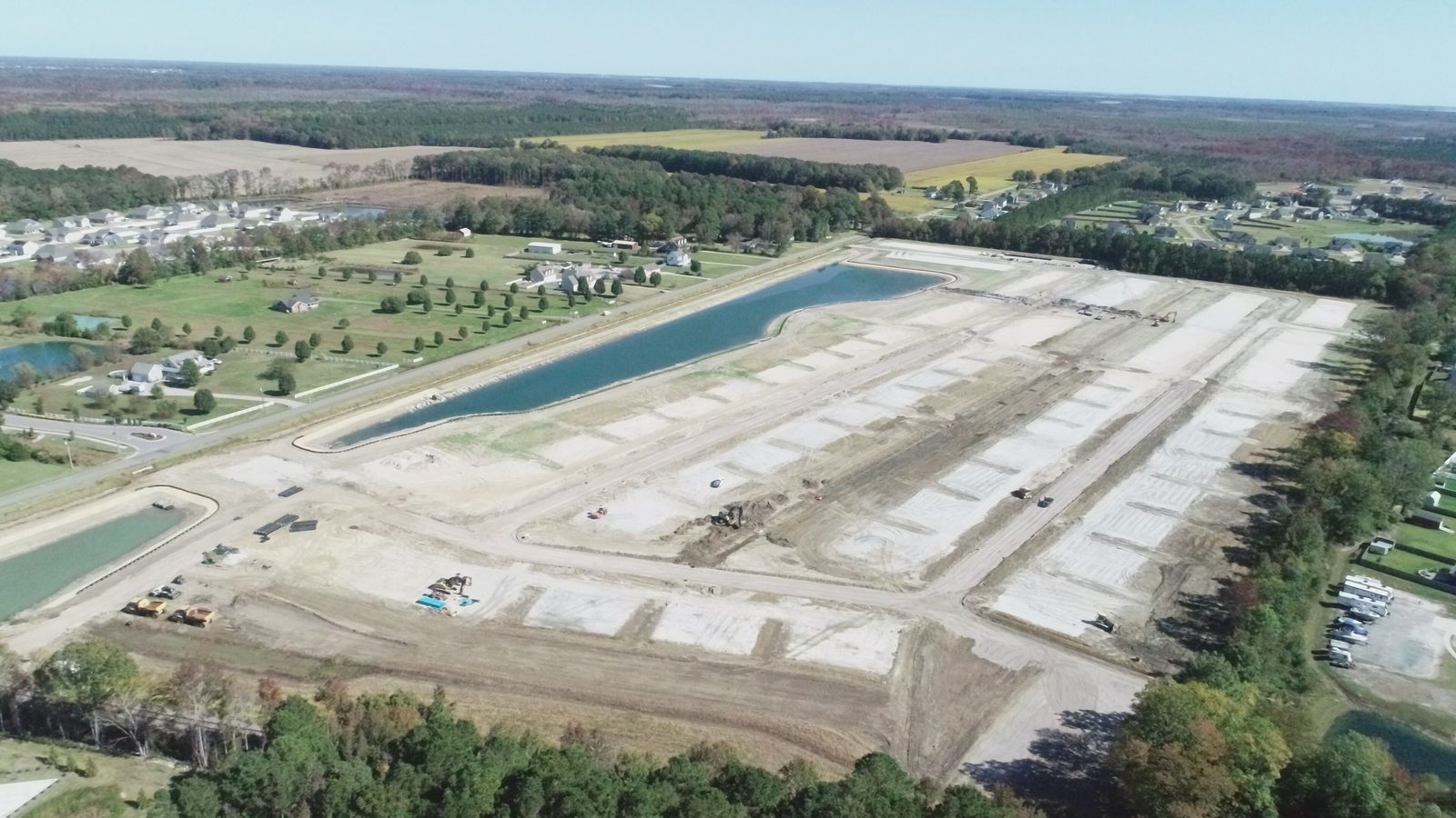 Aerial view of Baxter Station subdivision with graded lots and stormwater ponds