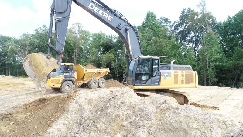 South Mills Landing South — Deere 350G excavator loading articulated dump truck