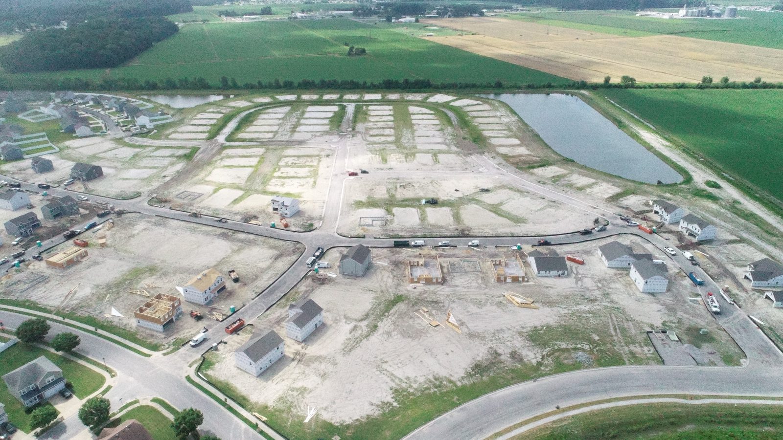 Completed Stockbridge subdivision site with paved roads and established turf